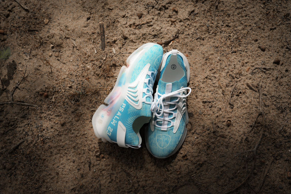 Psalm 23s Quiet Waters colorway pair on sand